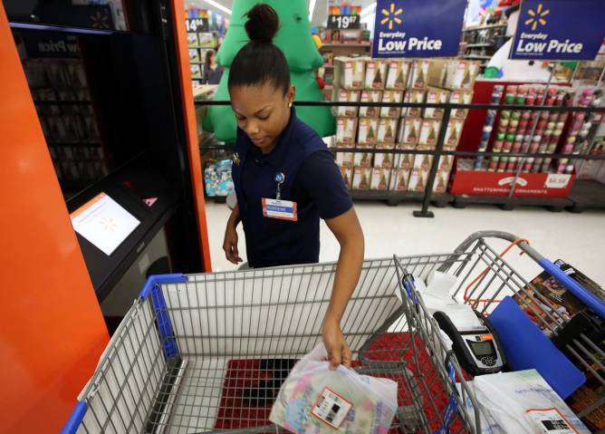 A Walmart employee working in one of the retailer's stores.