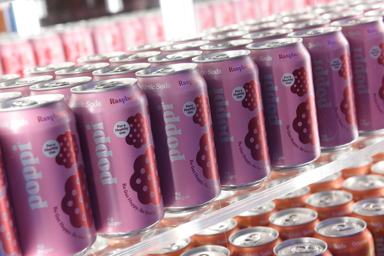 Poppi raspberry soda cans on shelf