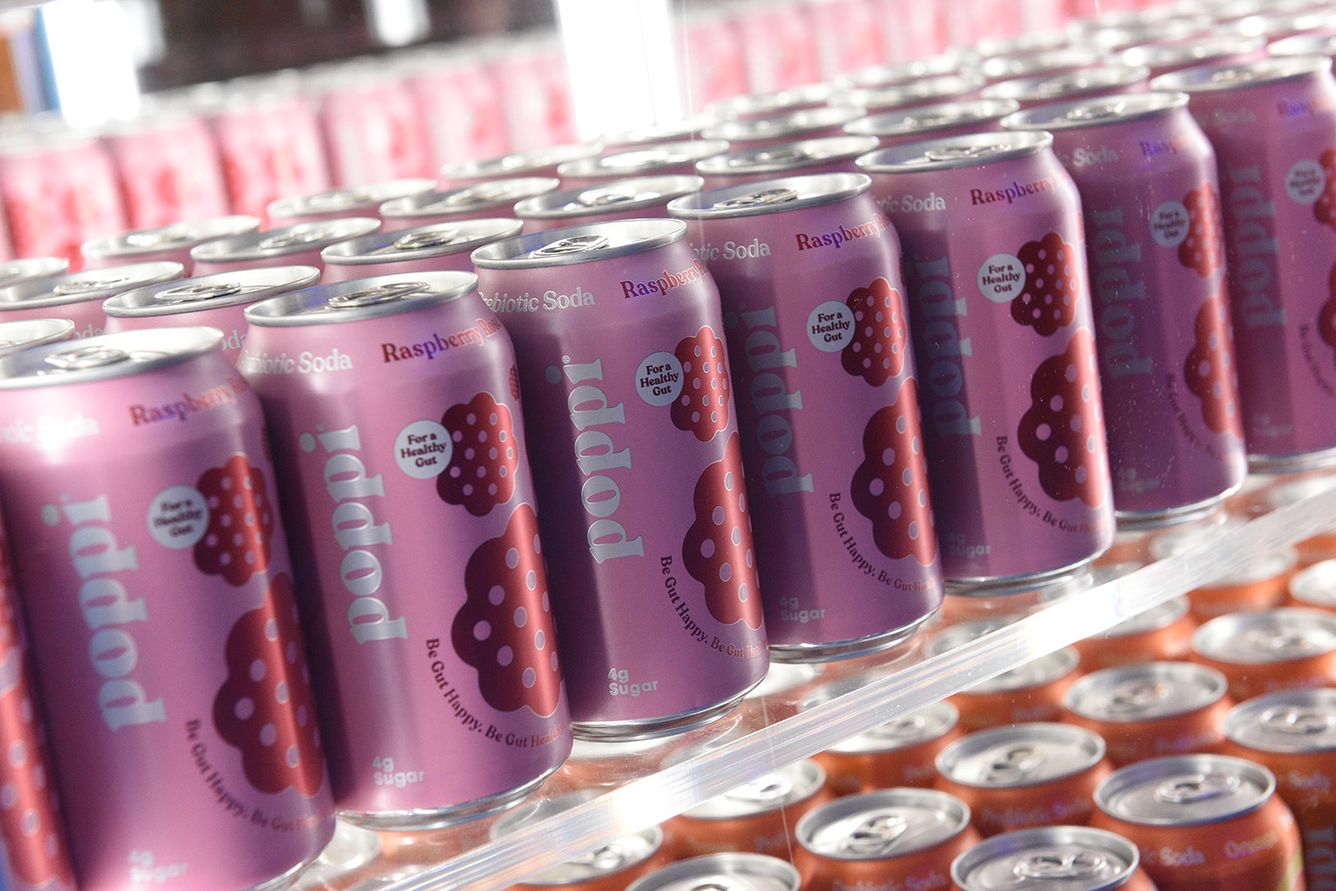 Poppi raspberry soda cans on shelf