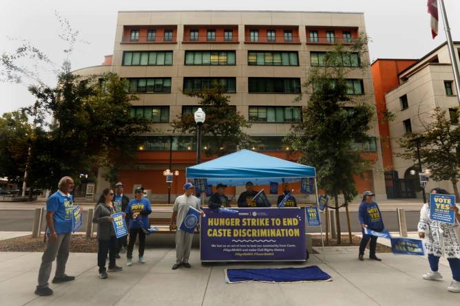 Thenmozhi Soundararajan, of Equality Labs, leads a group pushing for a law to ban caste discrimination, SB 403, rally in front of the Capitol Annex building.