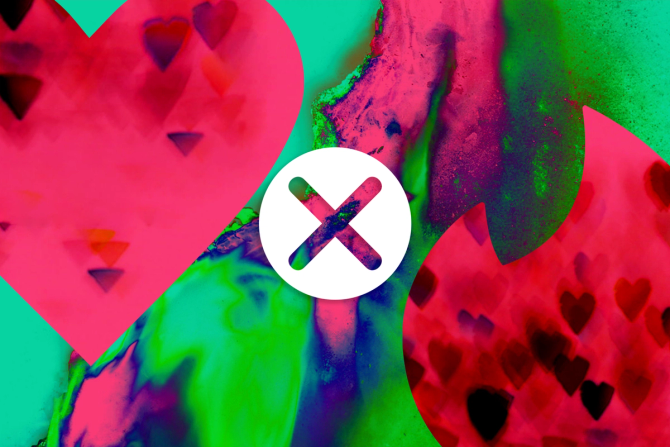 A heart and a flame surrounding an "X" outlined by a white circle