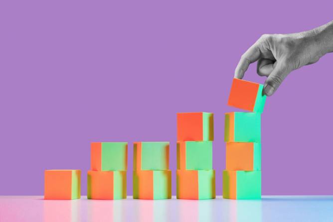 building blocks illustrating growth on a purple background