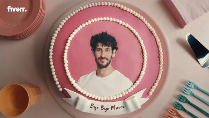 a photo of a man's head on a cake with the text 