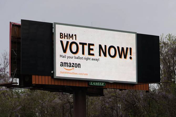 BESSEMER, AL - MARCH 28: An Amazon-sponsored billboard urging employees ...