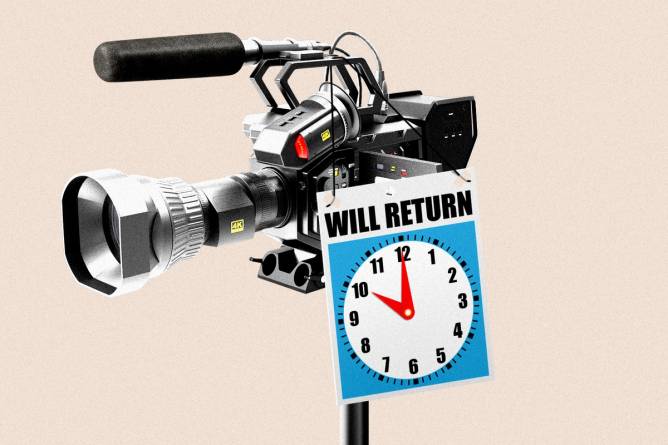 Camera with “will return” sign and clock on it.