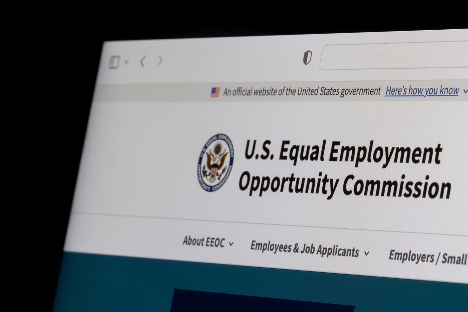 Laptop with open browser window, Government website, U.S. Equal Employment Opportunity Commission.
