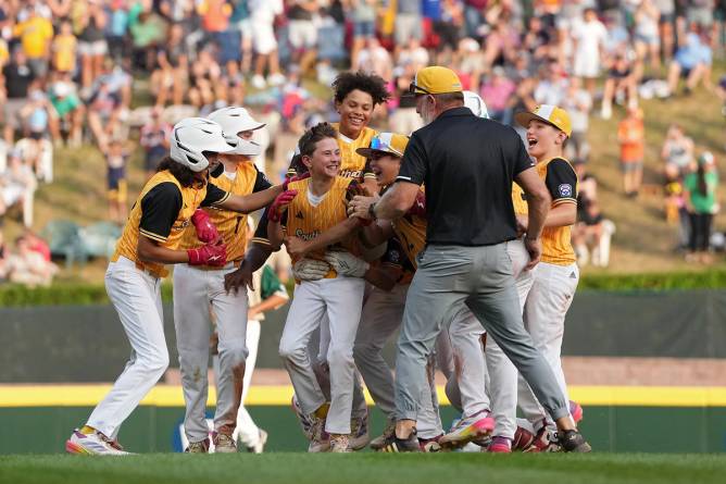 The Southeast Region team celebrates after beating the Asia-Pacific Region team from Taoyuan Ciy, Chinese Taipei.