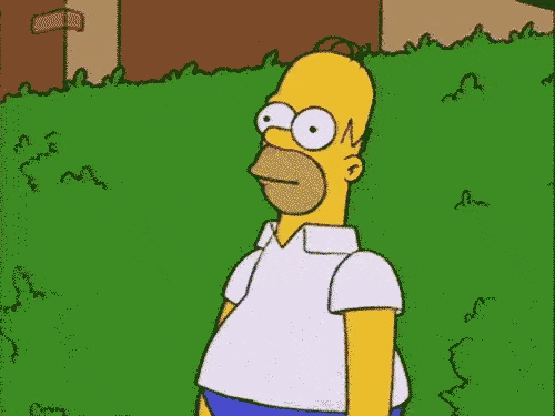 A gif of Homer Simpson slowly backing into leaves and disappearing.