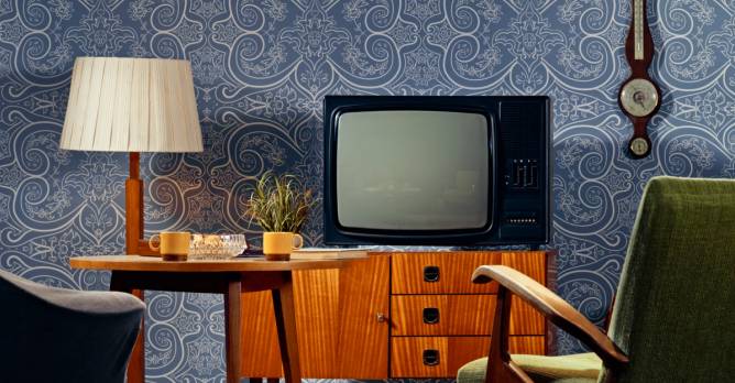 A classic TV set in a midcentury modern living room 