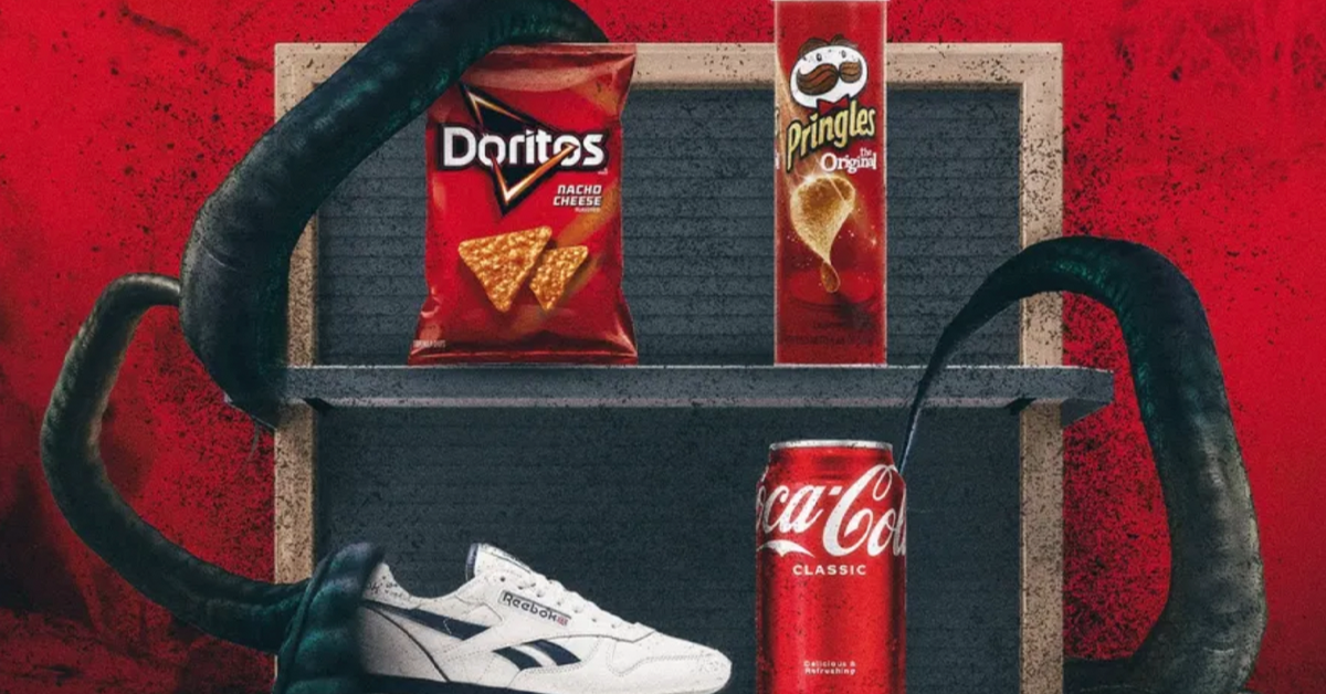 Product placement shelf holding a bag of Doritos, a can of Pringles, a can of Coca-Cola, and a Reebok sneaker surrounded by monster tentacles.