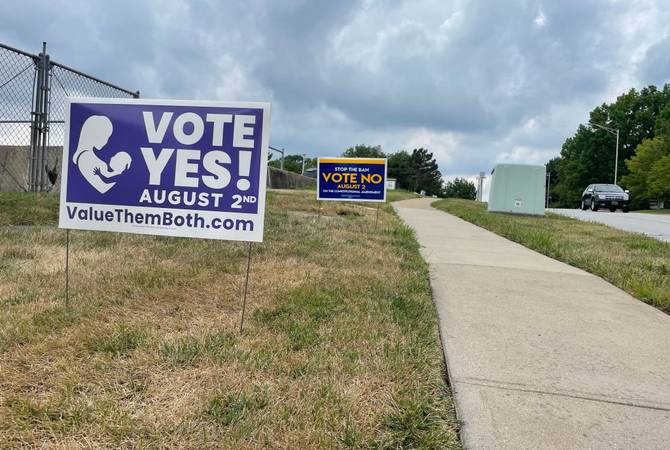igns calling on voters to vote no or vote yes are displayed in Prairie Village, Kansas, on July 28, 2022