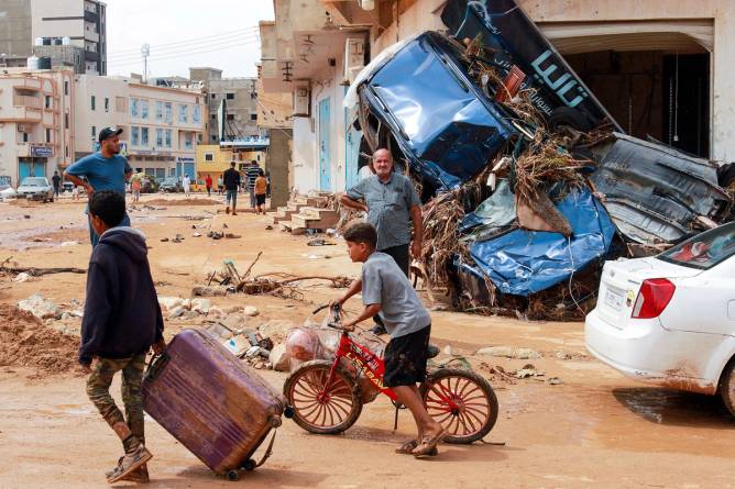 Aftermath of floods in Libya. Mud and destroyed cars.