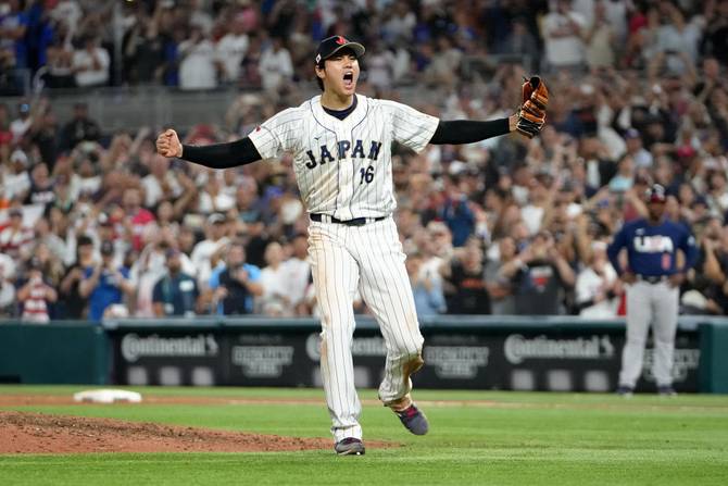 Shohei Ohtani #16 of Team Japan reacts after the final out of the World Baseball Classic Championship defeating Team USA