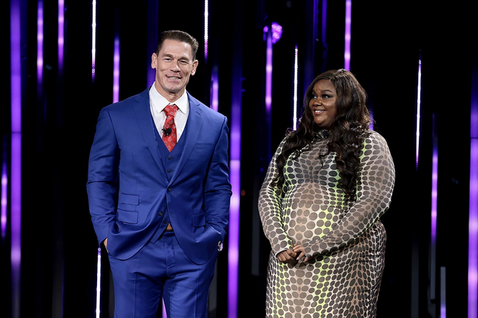 John Cena and Nicole Byer at Warner Bros. Discovery upfront 2022