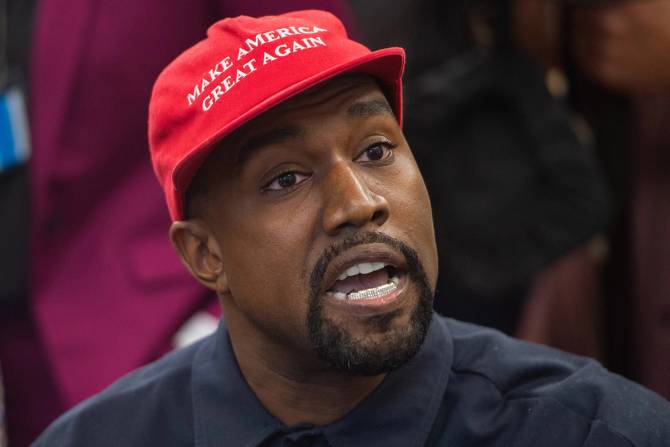 Kanye West in a "Make America Great Again" hat