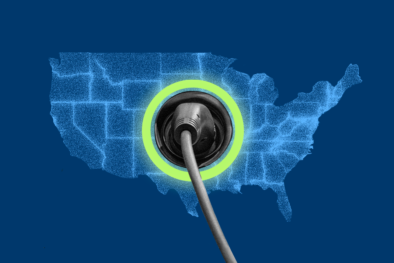 A map of the US lit up by the electric grid with an EV charger plugged into the center of the map