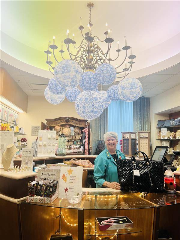 An older woman in a hospital gift shop