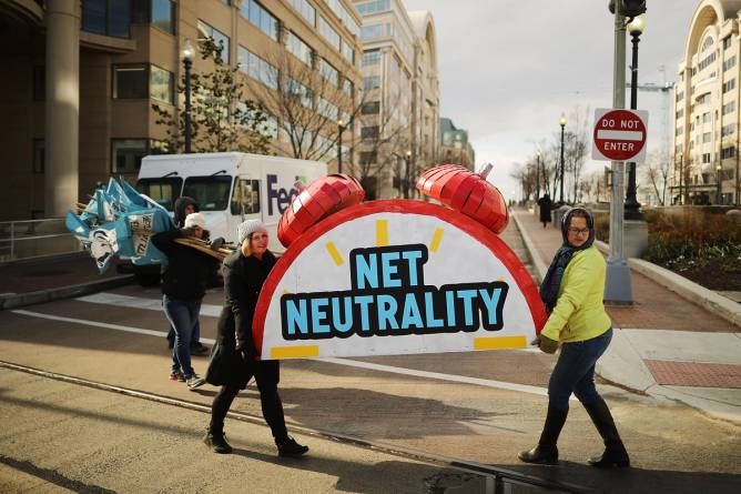 Protestors at a 2017 rally against the repeal of net neutrality rules. 