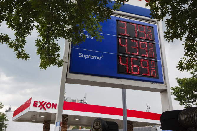 Gas prices are displayed at an Exxon gas station