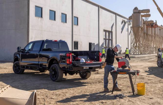 A Ford F-250 truck at a work site.