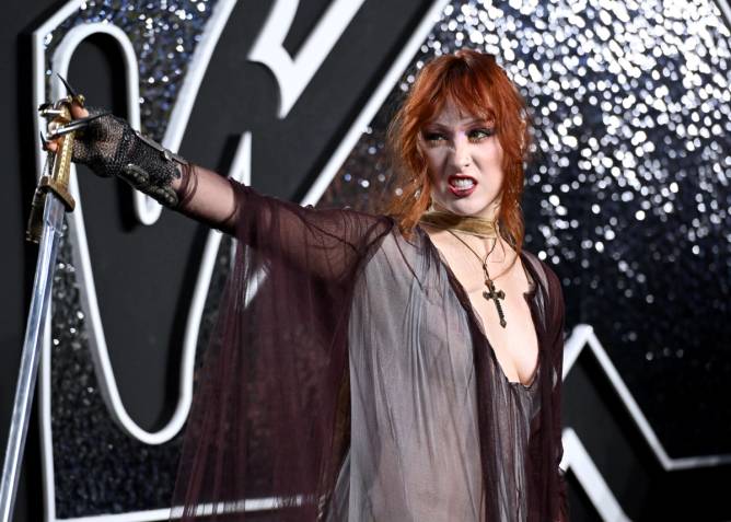 Singer Chappell Roan with a sword.