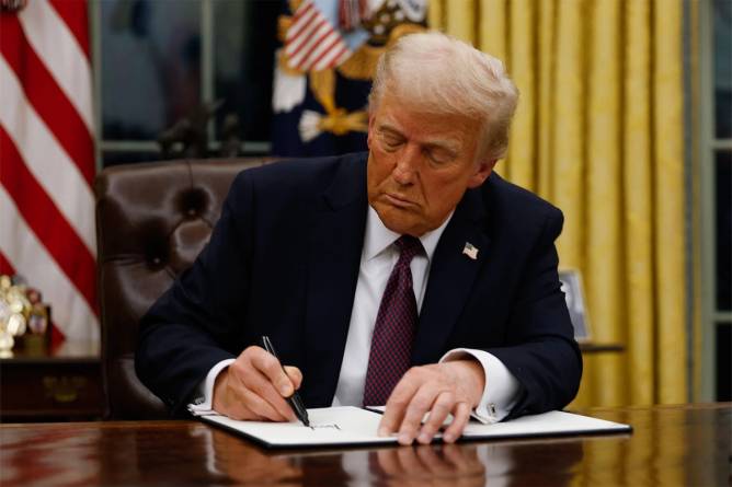 President Donald Trump signing an executive order