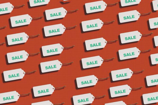 Image of sales tags on a red background.