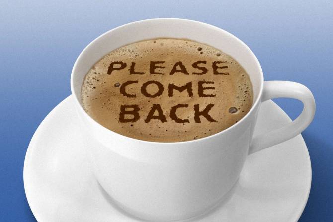 A latte that says Please Come Back on it