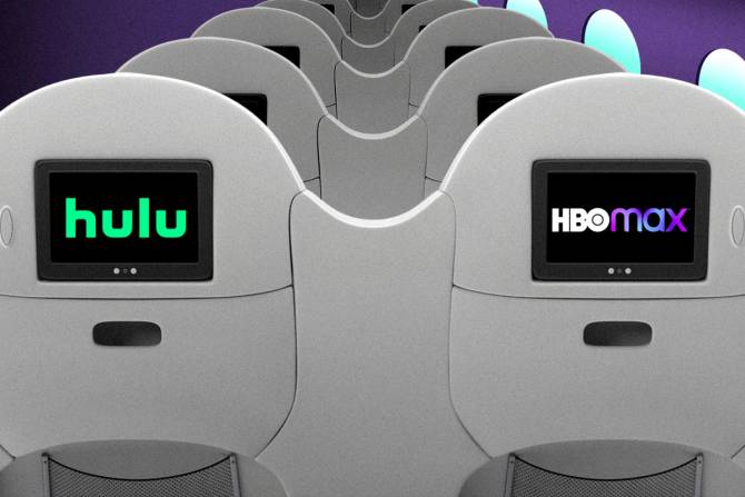 the back of two airplane seats; one features Hulu's logo and the other features HBO Max's