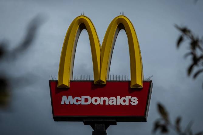 A grim McDonald's sign covered in nails