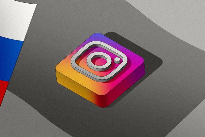 A Russian flag casts a shadow over the Instagram logo