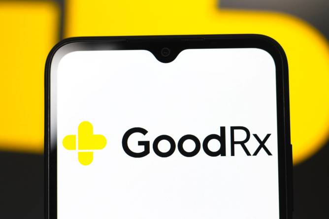 In this photo illustration, the GoodRx Holdings logo is seen displayed on a smartphone screen.