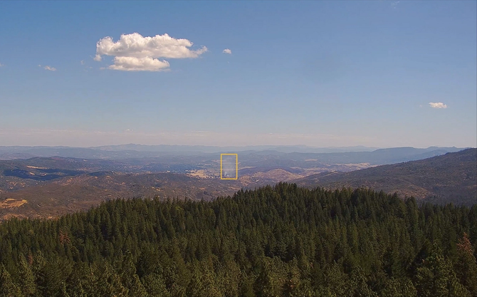 Rendering of Pano wildfire AI detection highlighting a plume of smoke in the distance