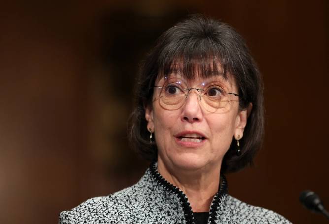 A woman with glasses