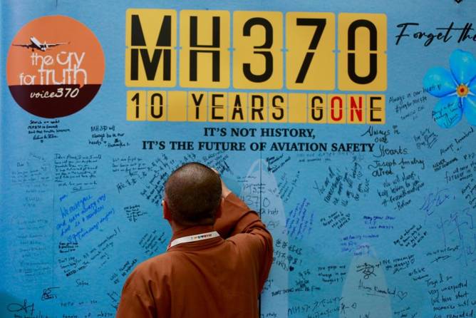 Visitors are writing messages at the Day of Remembrance for MH370 in Petaling Jaya, Malaysia, on March 3, 2024. Today marks the 10th anniversary of the disappearance of Flight MH370