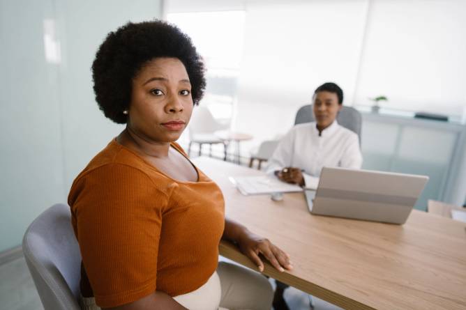 A Black woman at the doctor