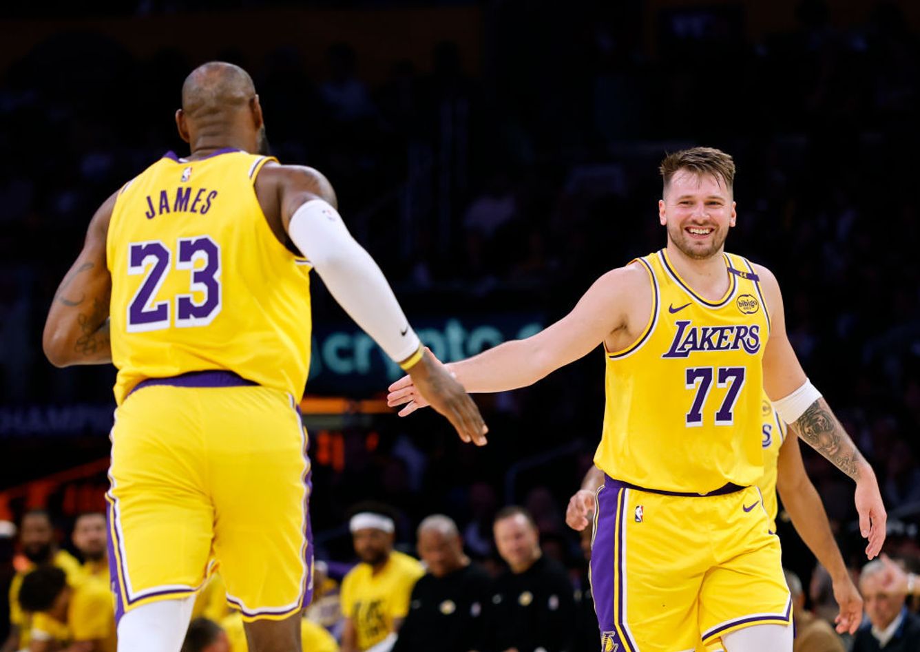 Lakers players high-five
