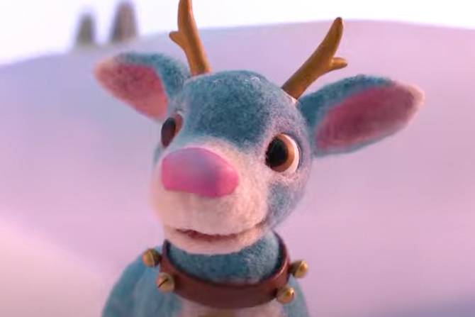 a photo of Macy's new holiday mascot Tiptoe, a blue reindeer