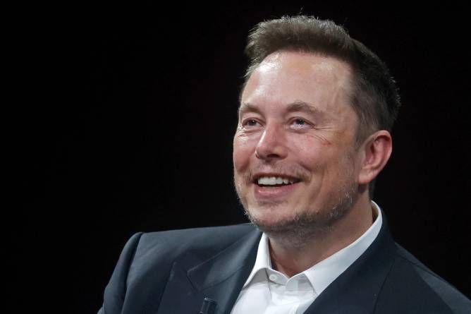 Elon Musk smiling
