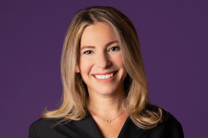 Alison Levin, a former Roku executive, in front of a purple background 