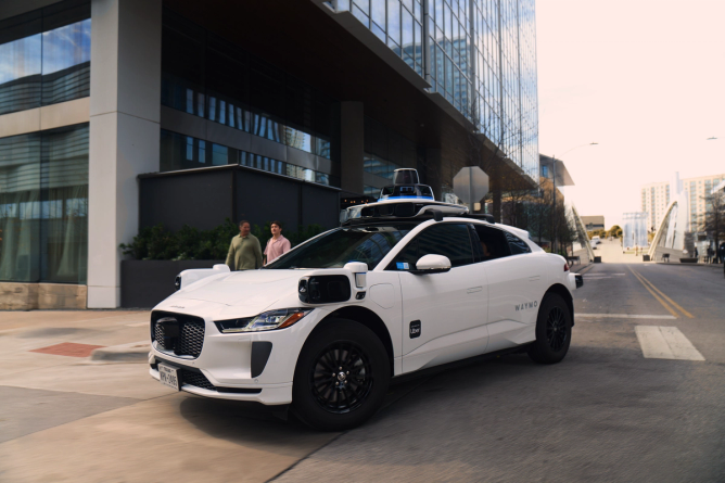 A co-branded Uber and Waymo autonomous vehicle.