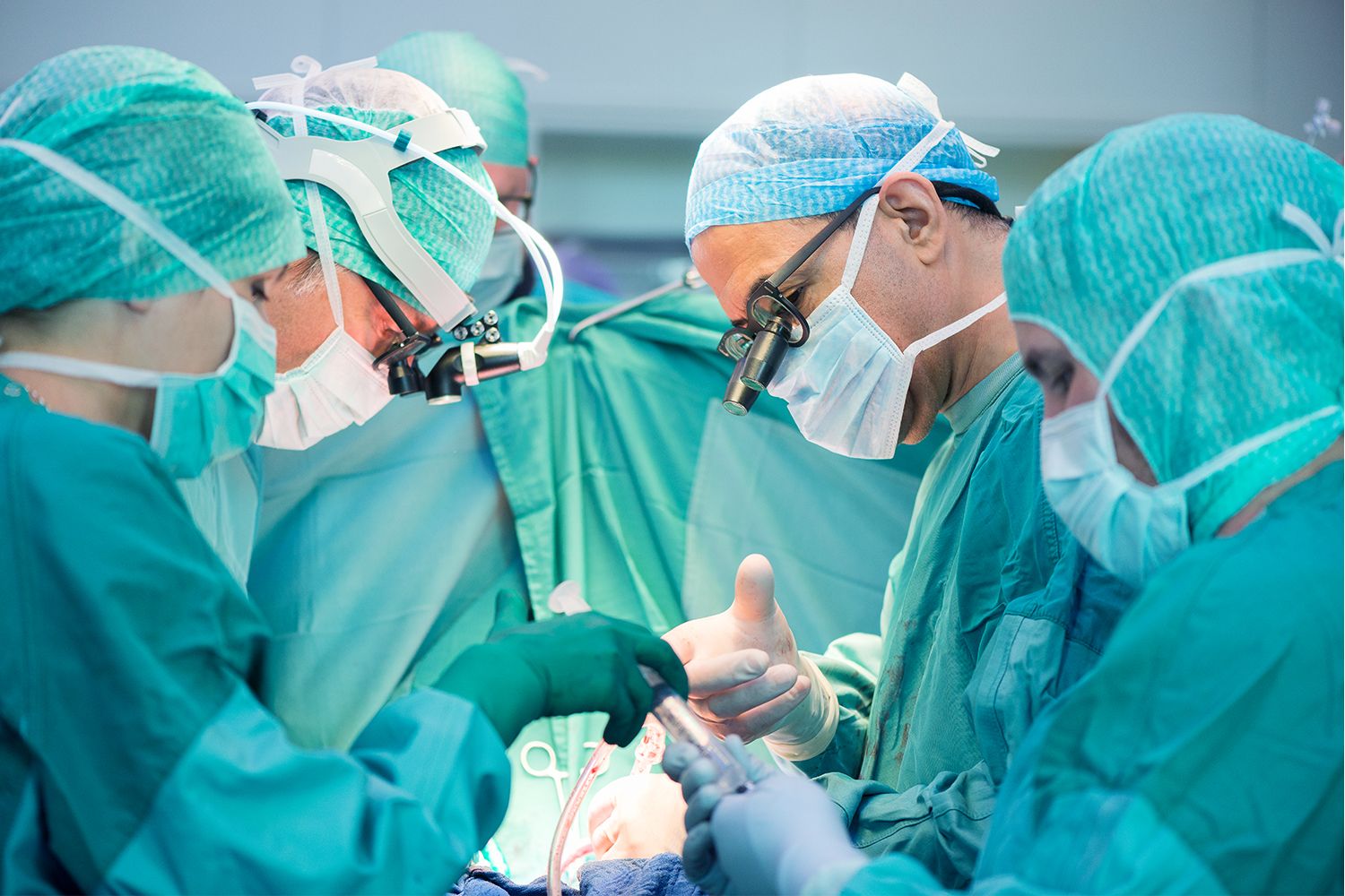 Heart surgeons during a heart operation