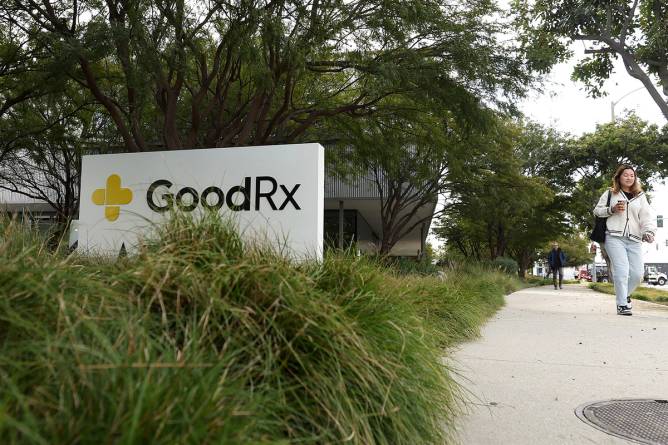 A sign is posted in front of GoodRX headquarters.