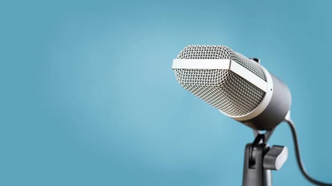 a microphone on a blue background