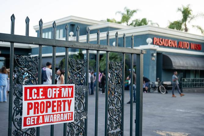 A sign at a business following an immigration raid