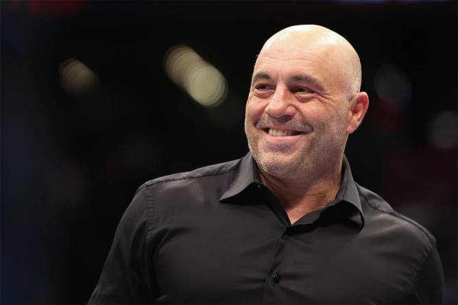 Joe Rogan smiling strangely.