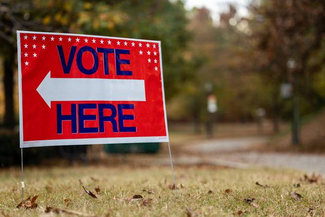 Vote here sign