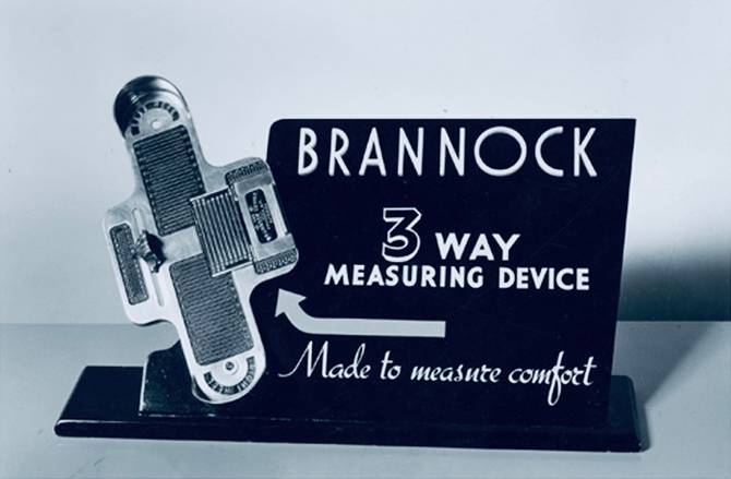 An archival photo of the Brannock Device, which measures feet to fit shoes properly. 