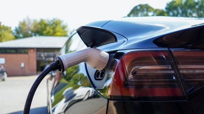 image of a plug in an EV