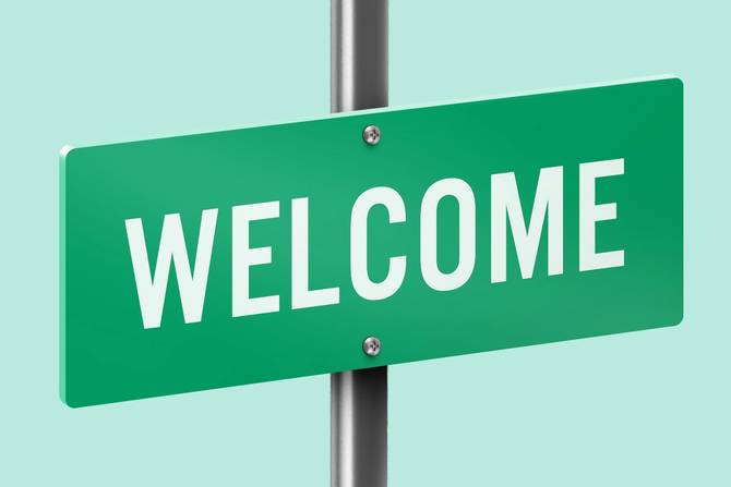 An illustration of a green "WELCOME" sign